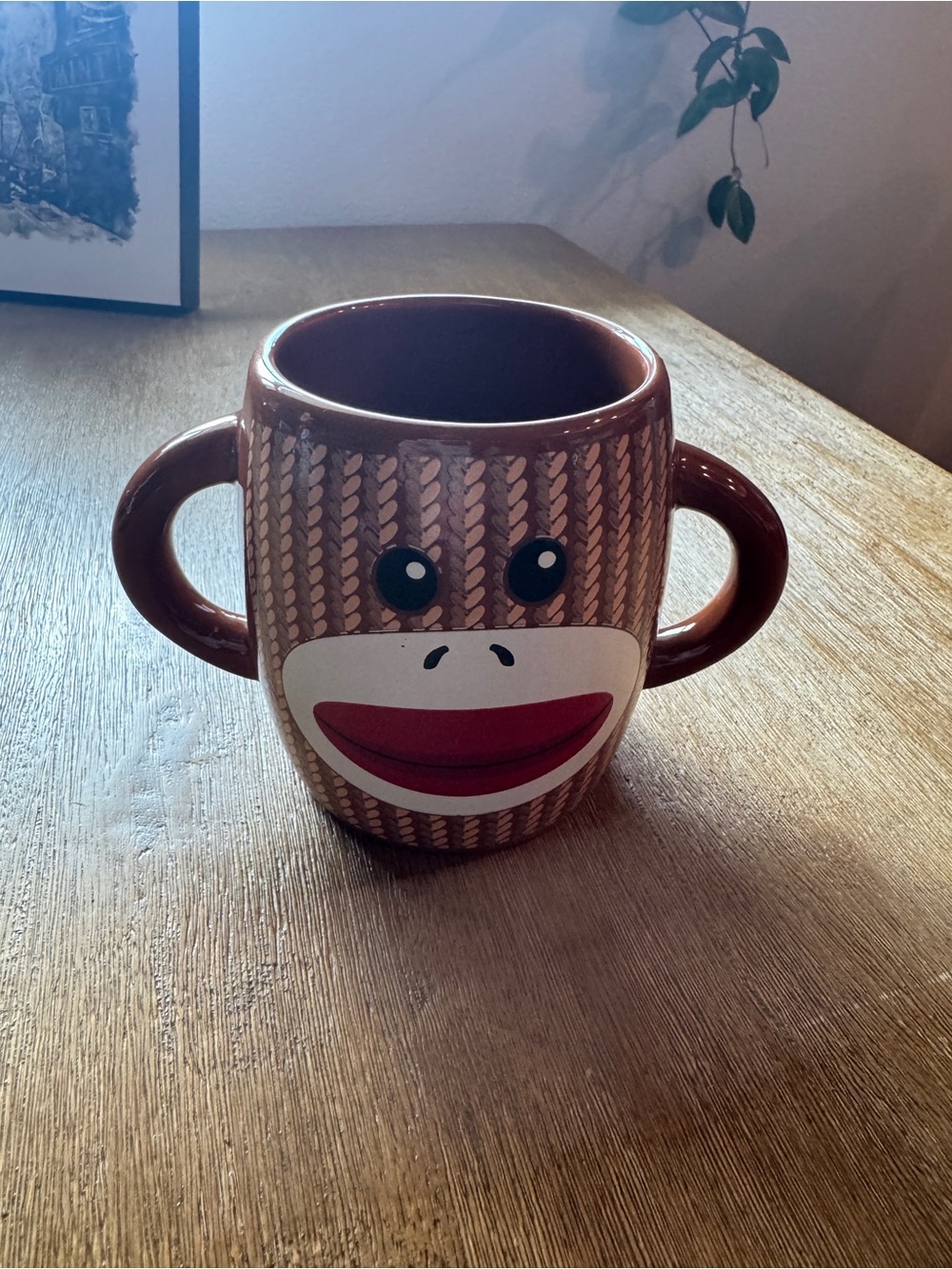 Galerie brown ceramic sock monkey mug featuring two handles - Picture 2 of 4
